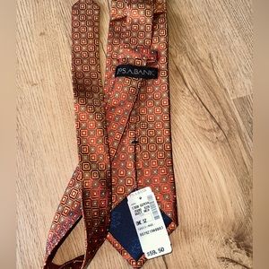 Jos A Bank rust colored square silk tie